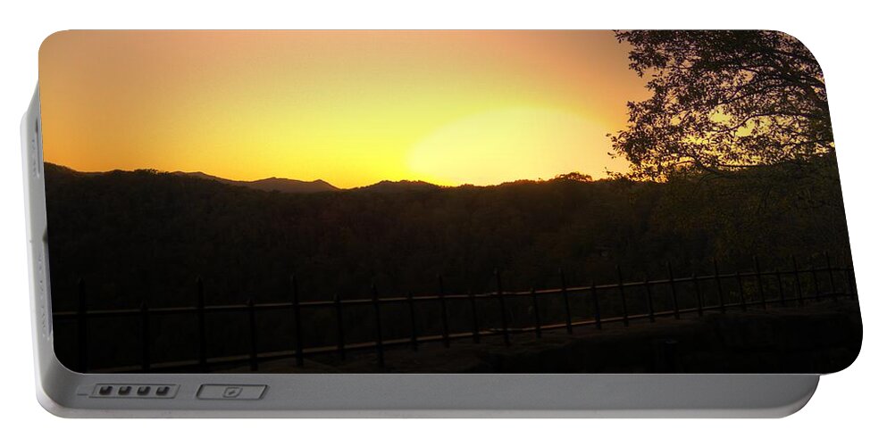 River Portable Battery Charger featuring the photograph Sunset behind hills by Jonny D