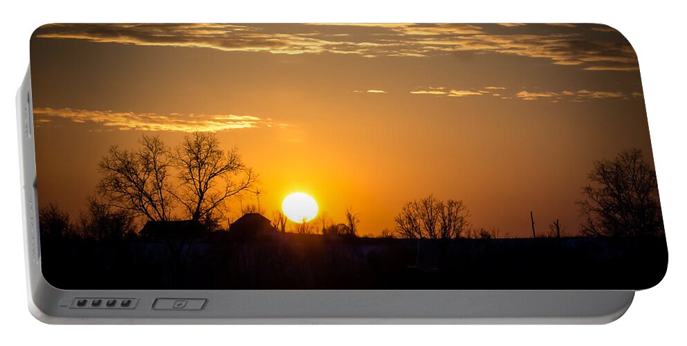 Sunset Portable Battery Charger featuring the photograph Sunset Over the Distant Farm by Holden The Moment