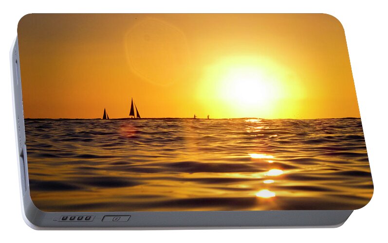 Beauty In Nature Portable Battery Charger featuring the photograph Sunset Over The Water In Waikiki by Elyse Butler