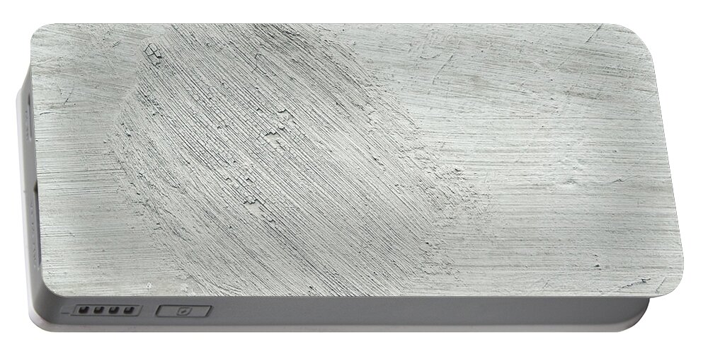 Abstract Portable Battery Charger featuring the photograph Textured stone background by Tom Gowanlock