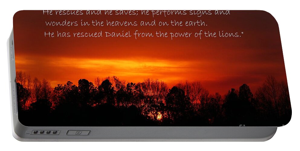 Reid Callaway Hisworks Portable Battery Charger featuring the photograph The Bibles says.... Daniel 6 vs 27 NIV by Reid Callaway