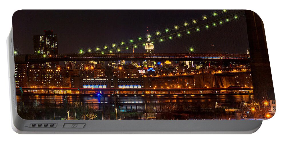 Amazing Brooklyn Bridge Photos Portable Battery Charger featuring the photograph The Empire State Building Framed by the Brooklyn Bridge by Mitchell R Grosky