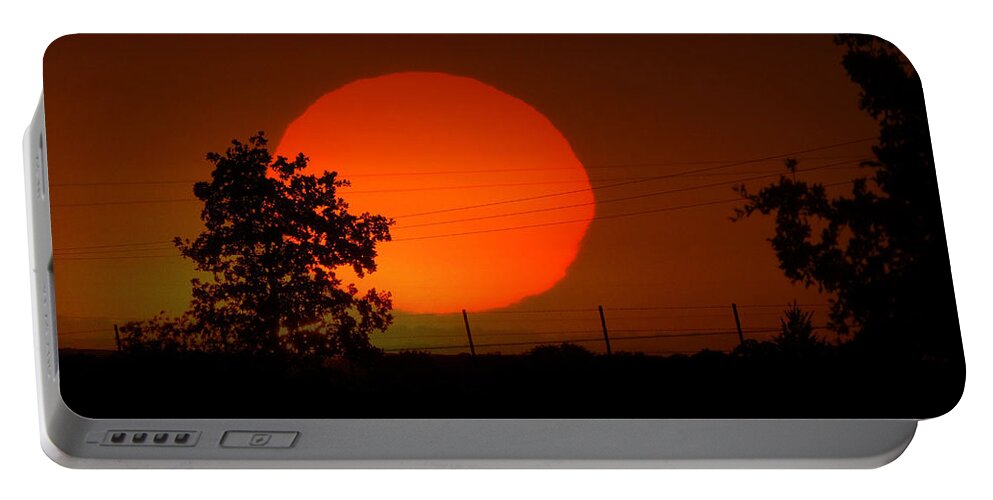 Sunset Portable Battery Charger featuring the photograph The End to a Hot Day by Shannon Story