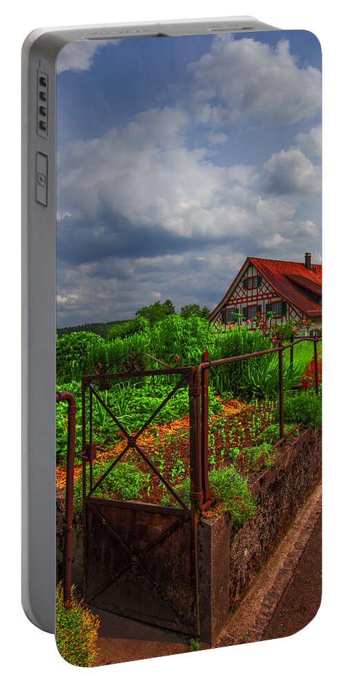 Austria Portable Battery Charger featuring the photograph The Garden Gate by Debra and Dave Vanderlaan