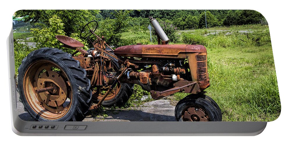 Tractor Portable Battery Charger featuring the photograph The Ghost of Farming Past by Kathy Clark