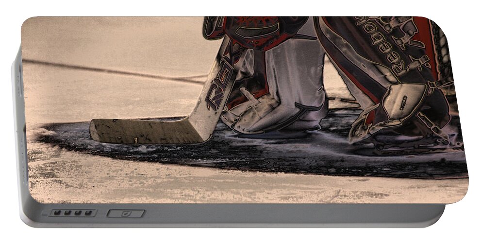 Hockey Portable Battery Charger featuring the photograph The Goalies Crease by Karol Livote