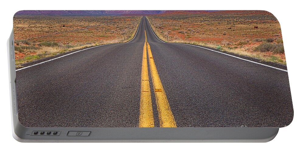 Red Soil Portable Battery Charger featuring the photograph The Long Road Ahead by Jim Garrison