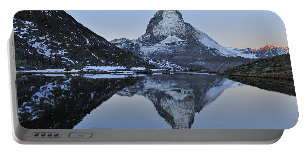 Feb0514 Portable Battery Charger featuring the photograph The Matterhorn And Riffelsee Lake by Thomas Marent