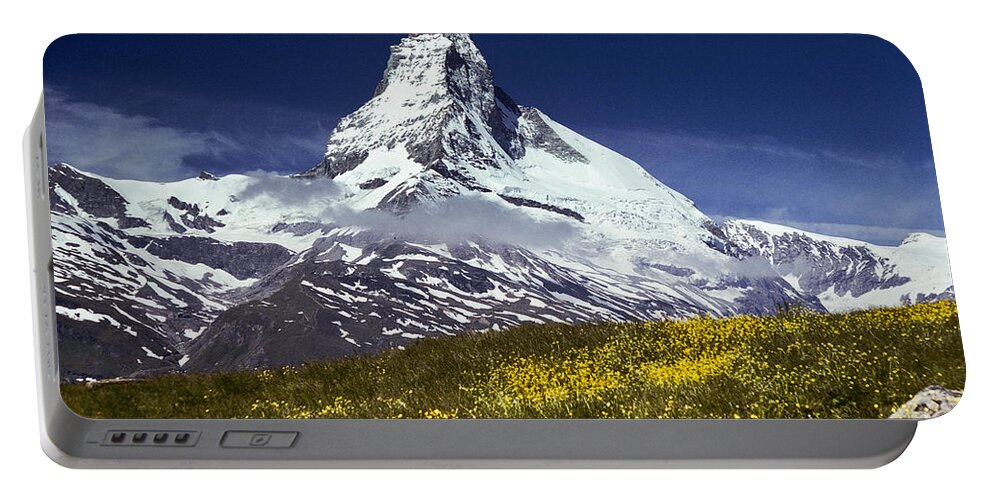 Alpine Portable Battery Charger featuring the photograph The Matterhorn with Alpine Meadow in Foreground by Jeff Goulden