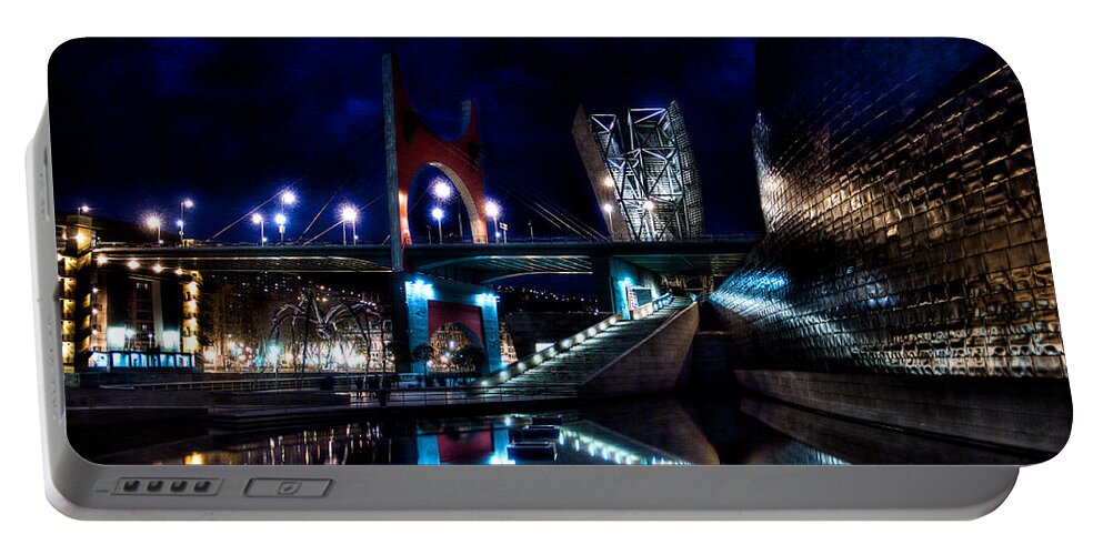 Guggenheim Portable Battery Charger featuring the photograph The Riverside pool of the Guggenheim Museum in Bilbao Spain by Weston Westmoreland
