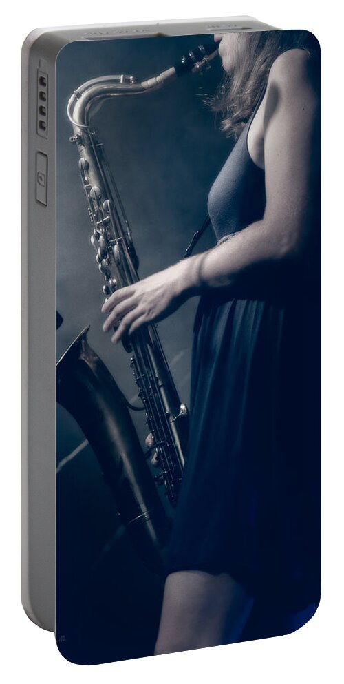 Sax Portable Battery Charger featuring the photograph The Saxophonist Sounds In The Night by Bob Orsillo