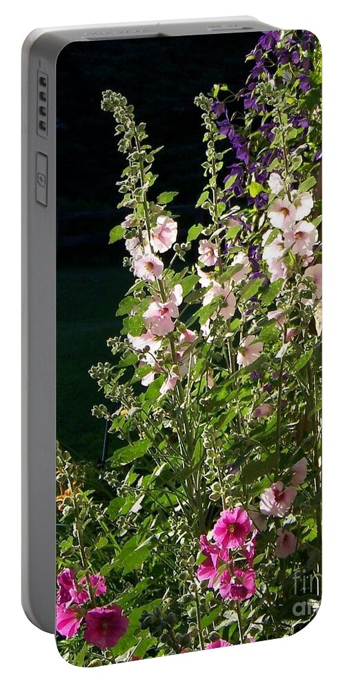 Hollyhocks Portable Battery Charger featuring the photograph The Secret Garden by Jackie Mueller-Jones