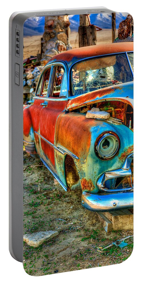 Thunder Mountain Indian Monument Portable Battery Charger featuring the photograph The Tired Chevy 2 by Richard J Cassato