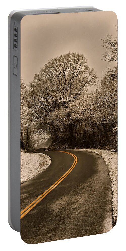 Images Portable Battery Charger featuring the photograph The Twisted Road by Flees Photos