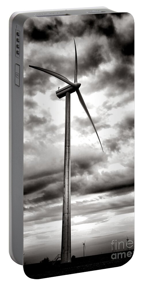 Windmill Portable Battery Charger featuring the photograph The Windmaster by Olivier Le Queinec