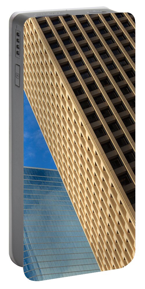 Architecture Portable Battery Charger featuring the photograph Tilted Skyscrapers by Raul Rodriguez