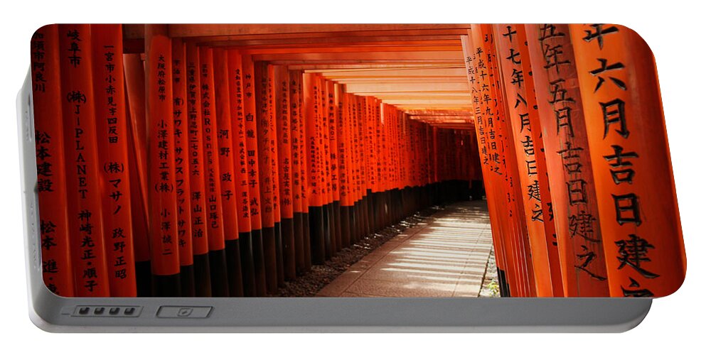 Sunshine Portable Battery Charger featuring the photograph Toriis at Fushimi Inari Shrine by Sam Garcia