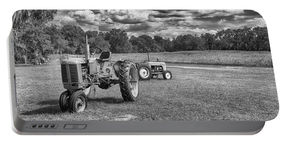 Landscape Portable Battery Charger featuring the photograph Tractors by Howard Salmon