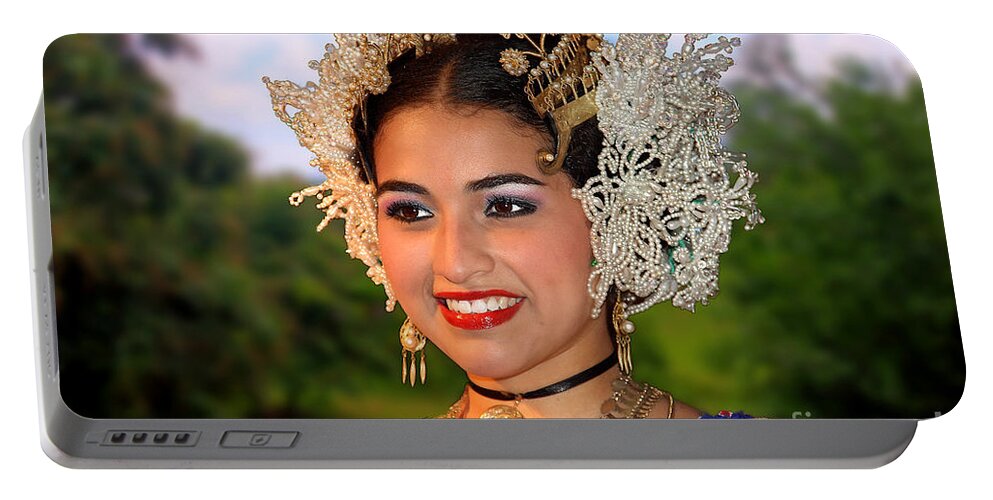 Panama Portable Battery Charger featuring the photograph Tradition and Beauty by Bob Hislop