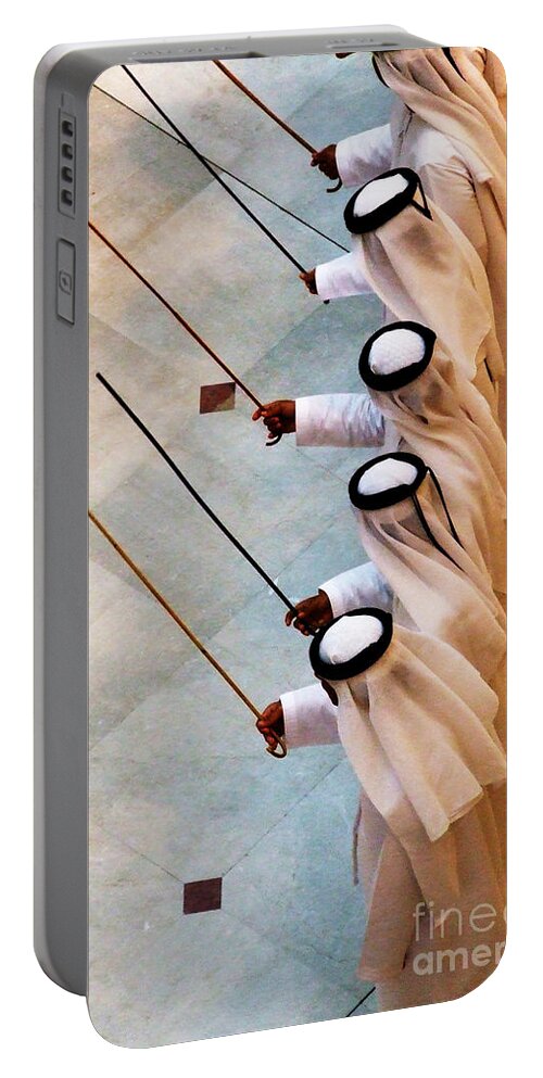 United Portable Battery Charger featuring the photograph Traditional Emirati Men's Dance by Andrea Anderegg