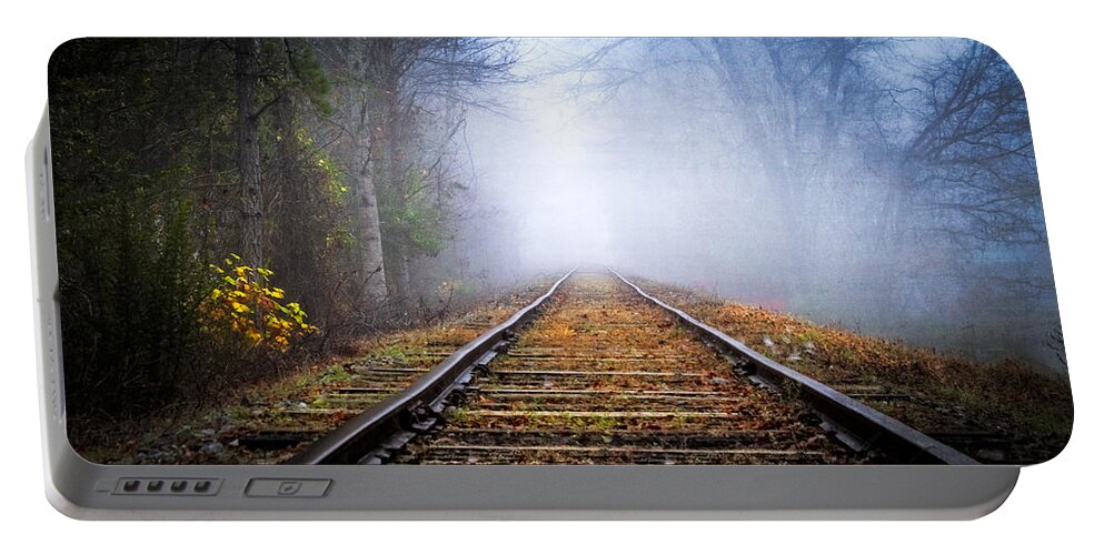 Andrews Portable Battery Charger featuring the photograph Traveling on the Tracks by Debra and Dave Vanderlaan