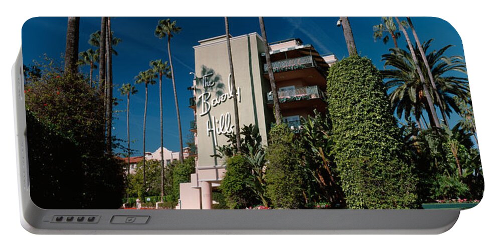 Photography Portable Battery Charger featuring the photograph Trees In Front Of A Hotel, Beverly by Panoramic Images