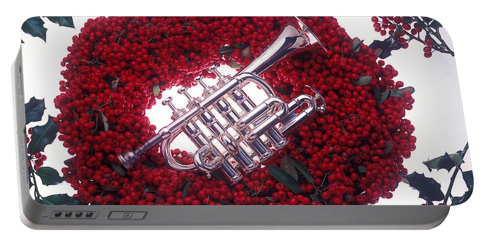 Trumpet Portable Battery Charger featuring the photograph Trumpet on red berry wreath by Garry Gay