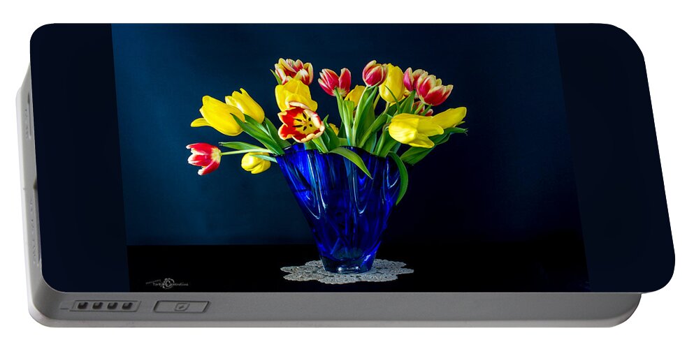 Tulips In Blue Portable Battery Charger featuring the photograph Tulips in Blue by Torbjorn Swenelius