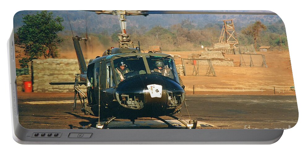  Uh-1 Portable Battery Charger featuring the photograph UH-1 Huey Iroquois Helicopter LZ Oasis Vietnam 1968 by Monterey County Historical Society