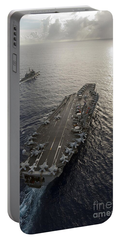 Uss George Washington Portable Battery Charger featuring the photograph Uss George Washington And Uss Mobile by Stocktrek Images