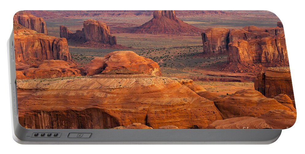 Monument Valley Portable Battery Charger featuring the photograph Valley of Monuments at Dawn by Bob Phillips