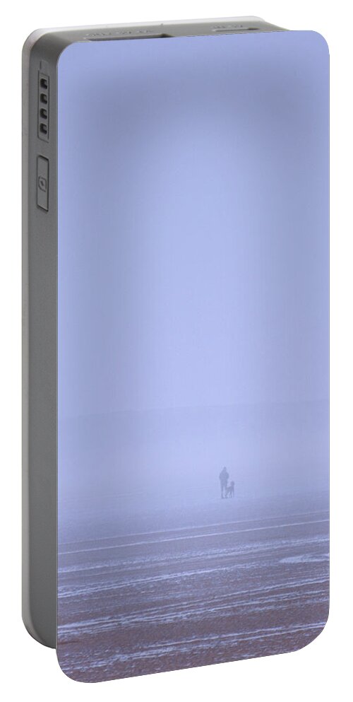 Walking Portable Battery Charger featuring the photograph Walking the dog in the mist by Spikey Mouse Photography