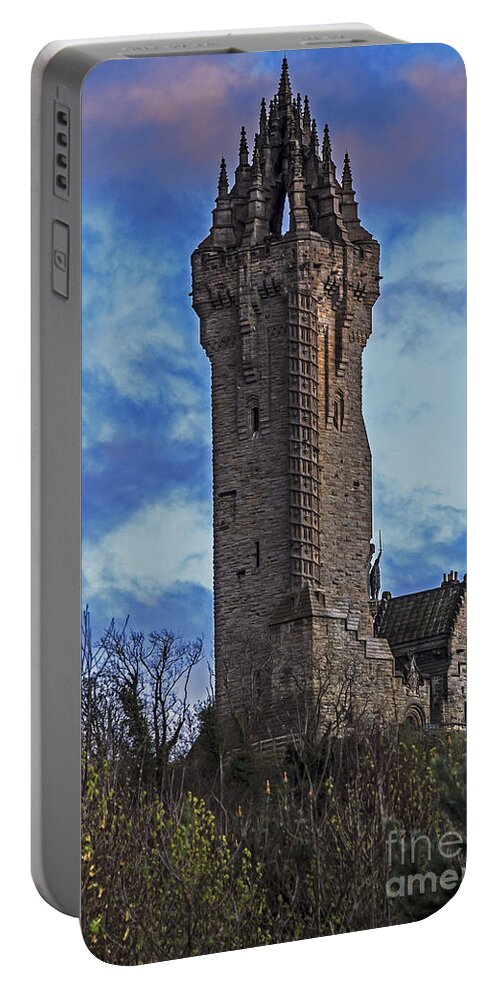 Travel Portable Battery Charger featuring the photograph Wallace Monument During Sunset by Elvis Vaughn