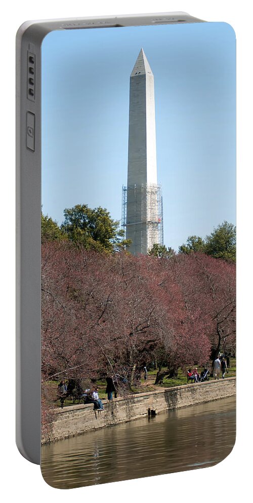 View Portable Battery Charger featuring the photograph Washington Monument reflected in Tidal Basin and surrounded by p by Alex Grichenko