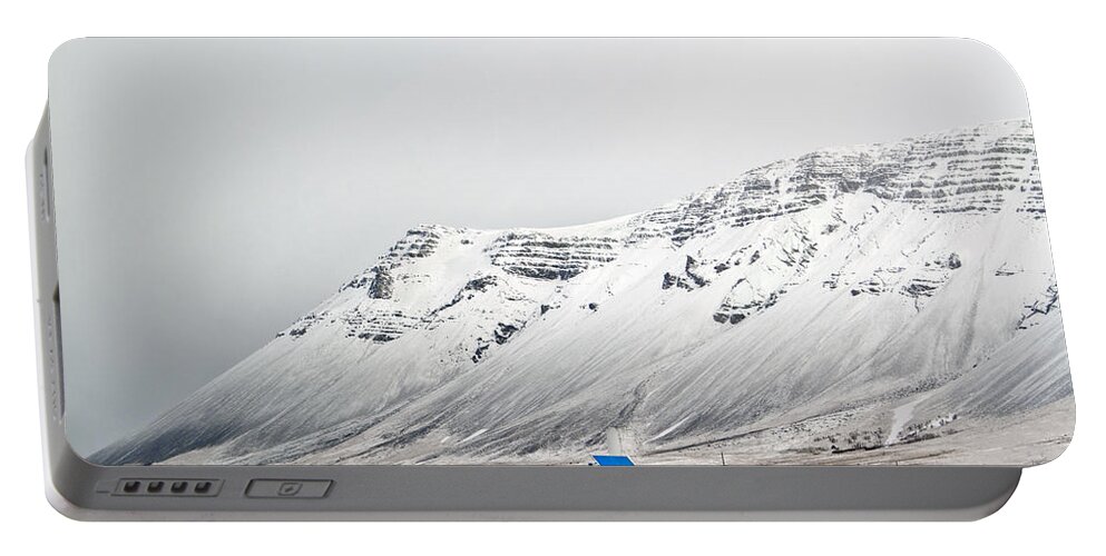Iceland Portable Battery Charger featuring the photograph What Lies Beneath by Evelina Kremsdorf