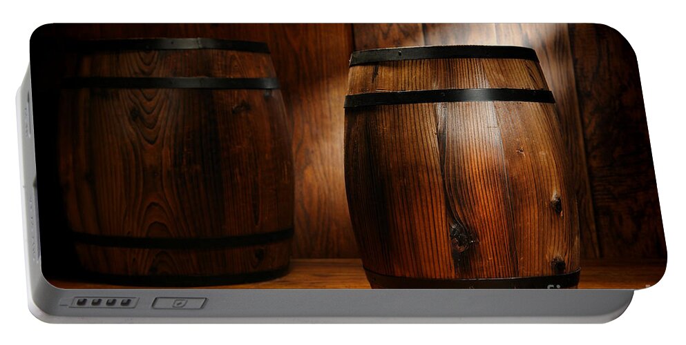 Barrel Portable Battery Charger featuring the photograph Whisky Barrel by Olivier Le Queinec