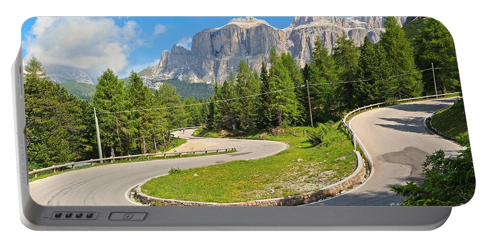 Alps Portable Battery Charger featuring the photograph 	winding road to Pordoi pass by Antonio Scarpi