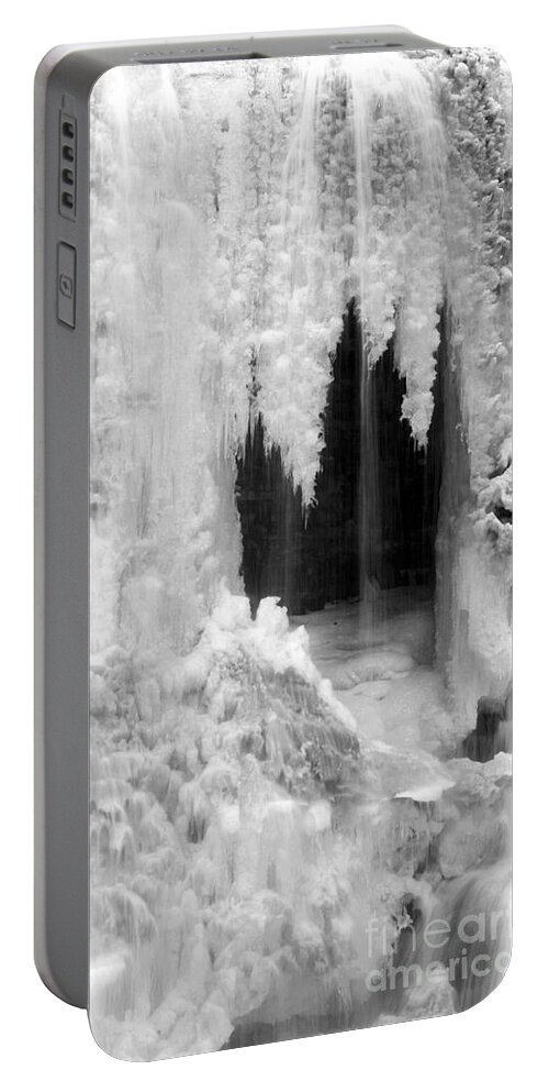 Winter Portable Battery Charger featuring the photograph Winter Cave by Jeannette Hunt