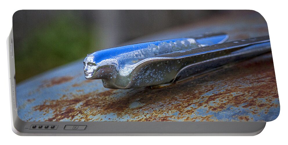 Torcwori Portable Battery Charger featuring the photograph 1950s Cadillac Hood Ornament - TORCWORI by Peter Ciro