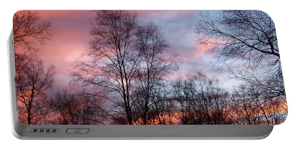 Fiery Portable Battery Charger featuring the photograph A Fiery Sundown by Kim Galluzzo