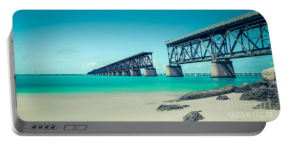 Atlantic Portable Battery Charger featuring the photograph Bahia Hondas Railroad Bridge by Hannes Cmarits