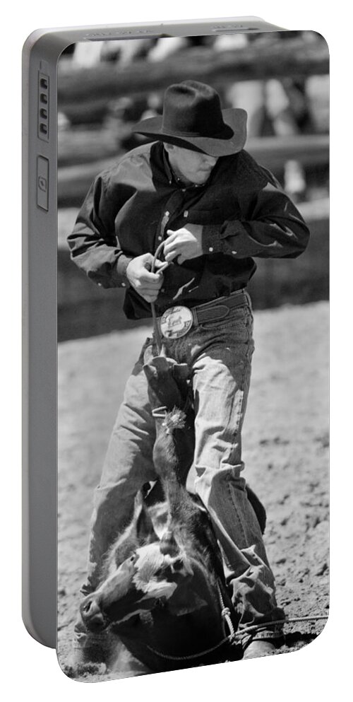 Rodeos Portable Battery Charger featuring the photograph Calf Roper by Michelle Wrighton