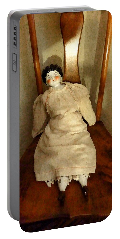 Doll Portable Battery Charger featuring the photograph China Doll on Chair by Susan Savad