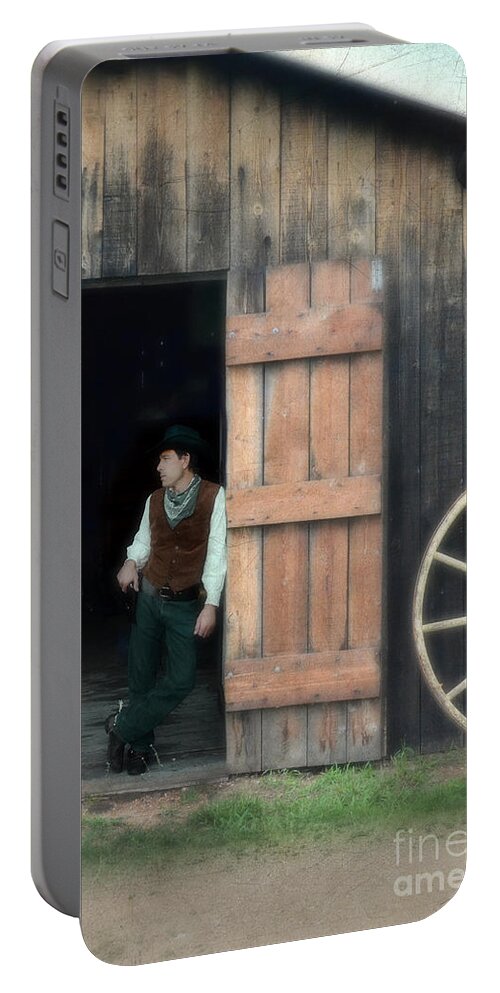 Man Portable Battery Charger featuring the photograph Cowboy Leaning on Barn Door by Jill Battaglia