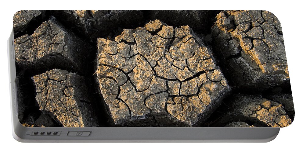 Fn Portable Battery Charger featuring the photograph Cracked, Dried Out Mud, Mokolodi Nature by Vincent Grafhorst