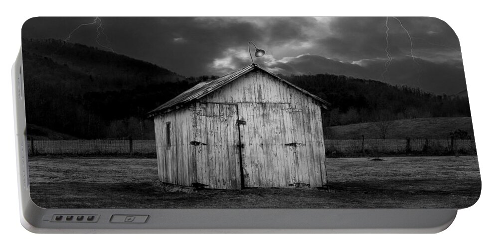 Shed Portable Battery Charger featuring the photograph Dry Storm by Ron Jones