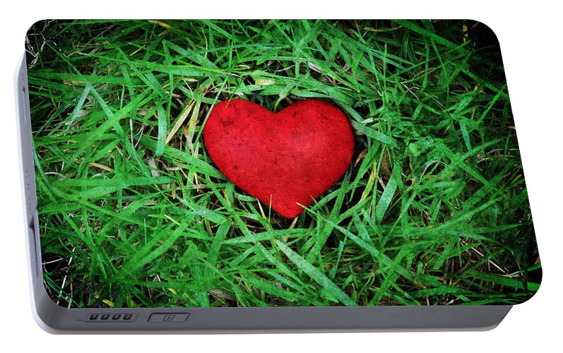 Background Portable Battery Charger featuring the photograph Eco heart by Laura Melis