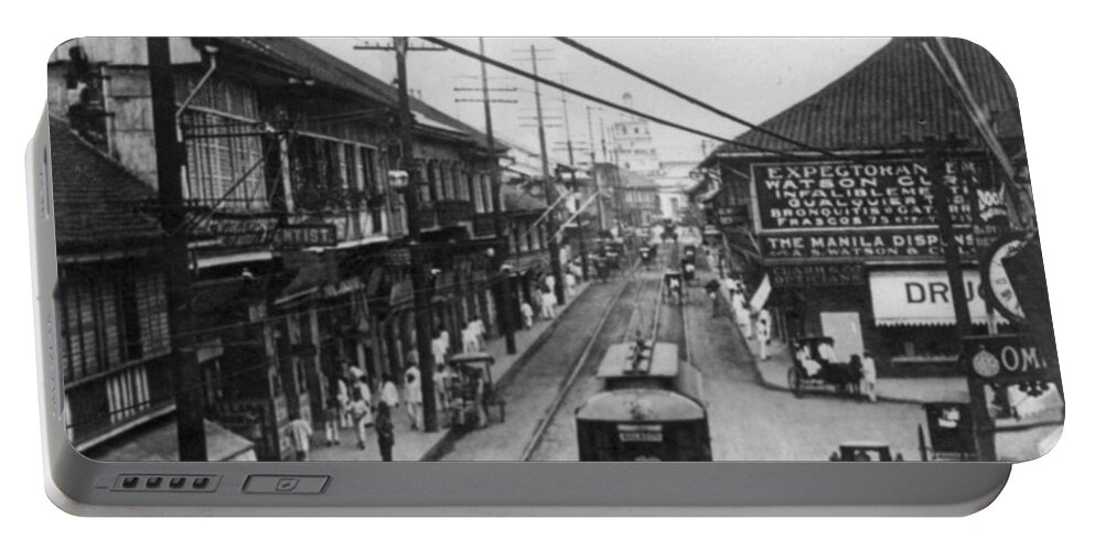 Manilla Portable Battery Charger featuring the photograph Escalta Street - Manilla Philippines - c 1906 by International Images