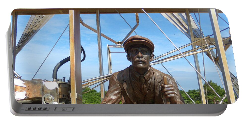 Historical Portable Battery Charger featuring the photograph First In Flight by Lydia Holly
