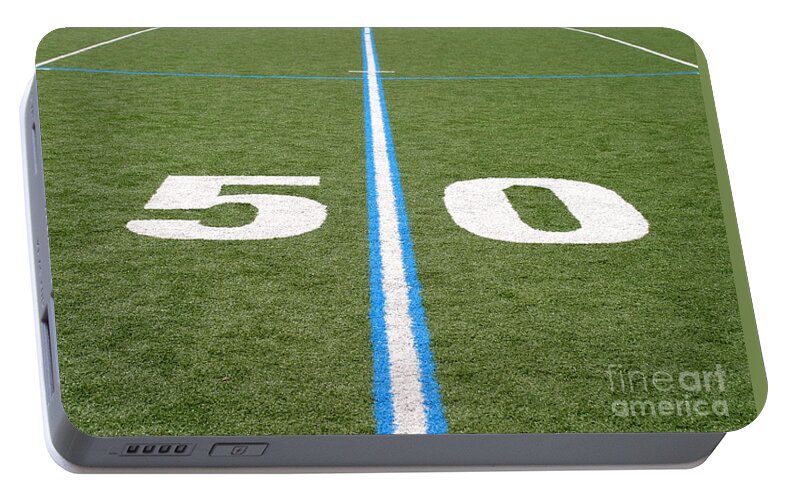 American Portable Battery Charger featuring the photograph Football Field Fifty by Henrik Lehnerer